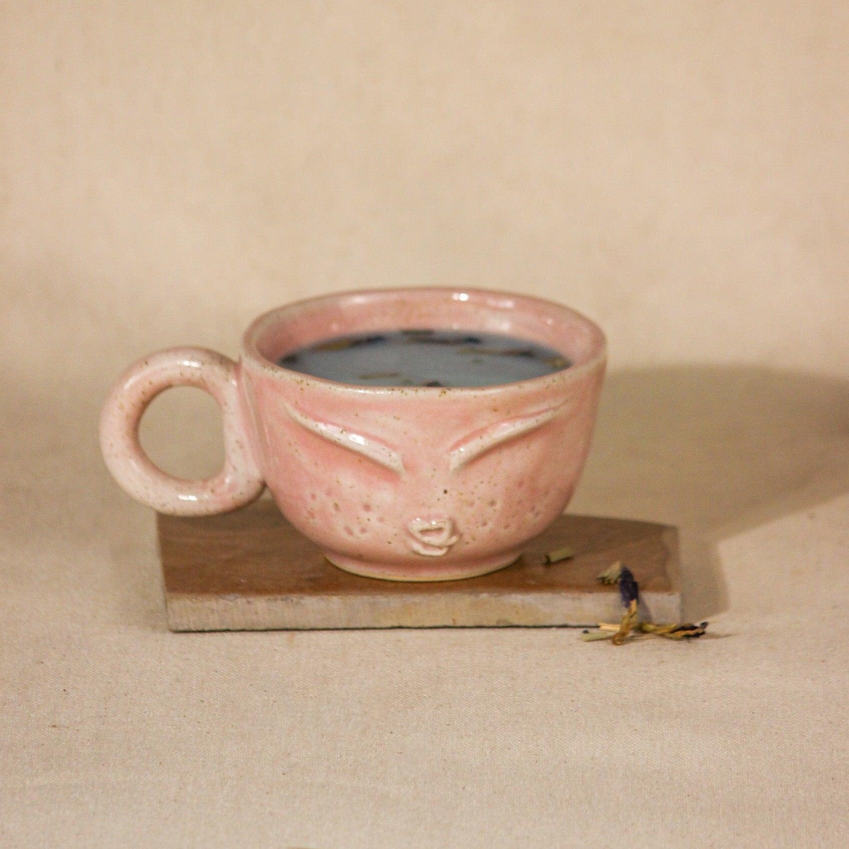 The Sage Face Ceramic Cappuccino Mug in Pink color- THE ORBY HOUSE