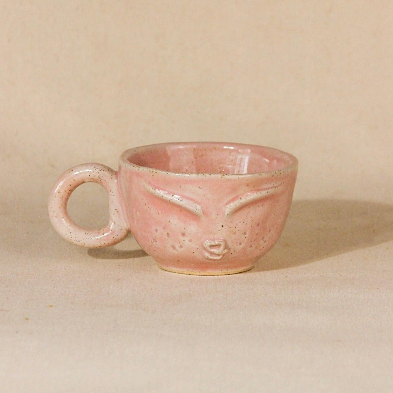 The Sage Face Ceramic Cappuccino Mug in Pink color- THE ORBY HOUSE